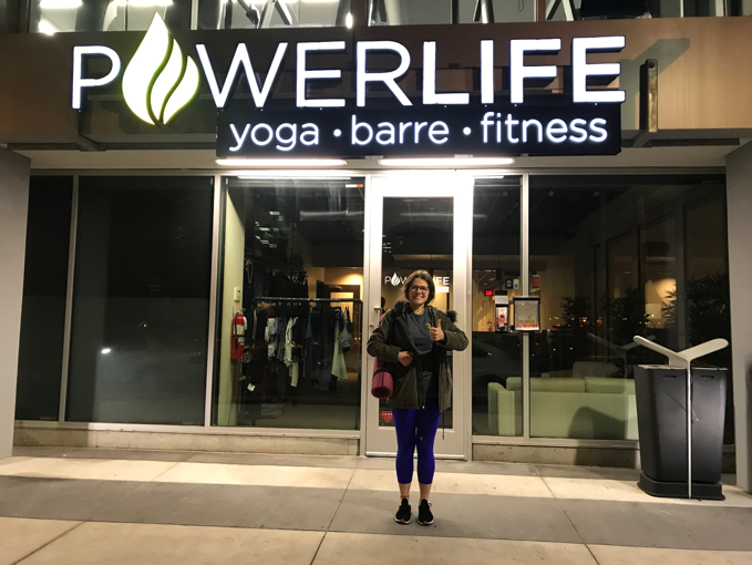 Carmen Macias, ’20, stands outside Power Life after a relaxing yoga class.
