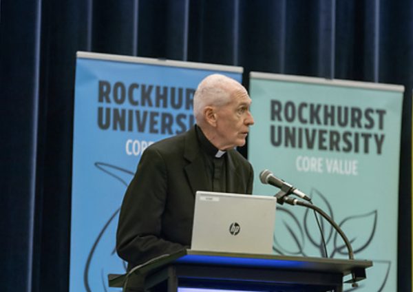 Fr. Curran speaks on the Jesuit Prison Education Ministry in Arrupe Hall at Rockhurst University