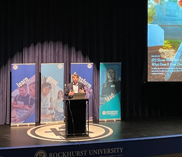 Adam Rothman speaking on “Slavery, Memory, and Reconciliation at Jesuit Universities in Arrupe Auditorium.