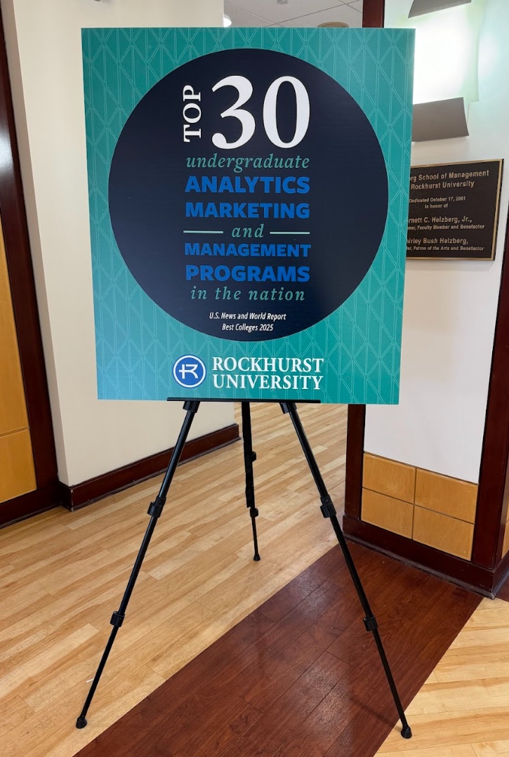 Rockhurst displays its U.S. News and World Report business accolades at the entrance of Conway Hall.