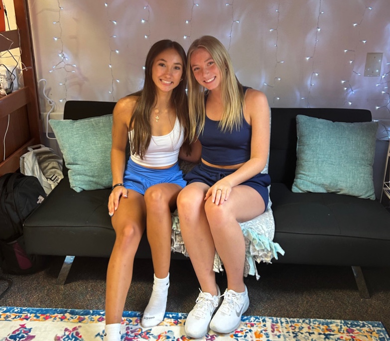 Freshmen Sophy Orsi (left) and Leah Heck (right) in their dorm room in Corcoran Hall.