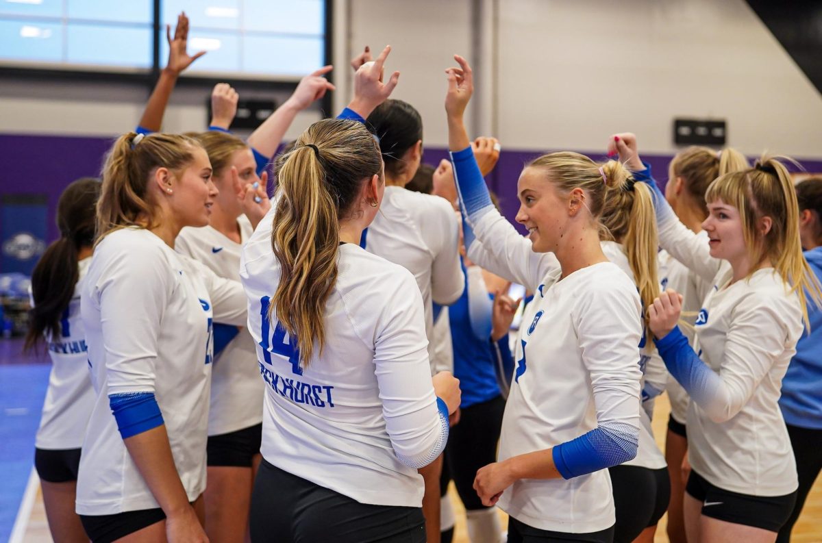 The Rockhurst women's volleyball team huddles between sets at the 2024 GLVC tournament. Photo provided by Sydney Raszler.